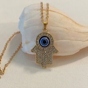 Gold Hamsa Necklace with Blue Eye